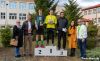 Biegacze stoją na podium